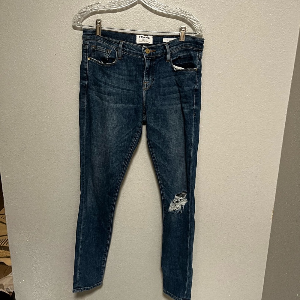 MID RISE RIPPED SKINNY JEANS